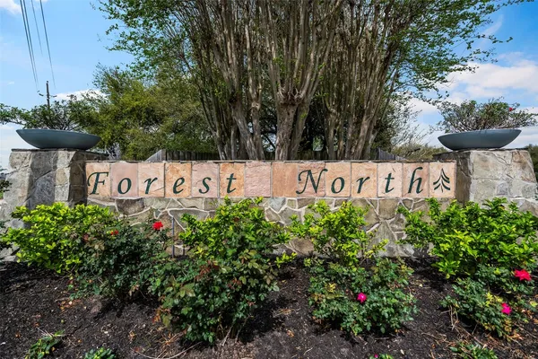 a sign on the side of the road