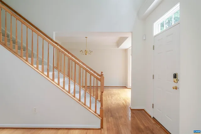 a kitchen with stainless steel appliances granite countertop a sink and a stove
