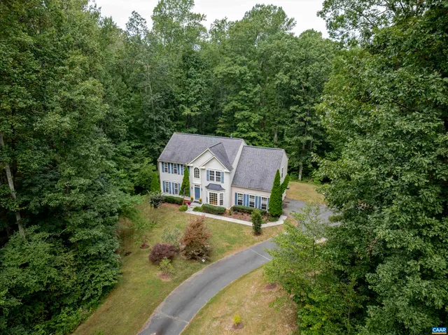 a view of balcony with wooden floor