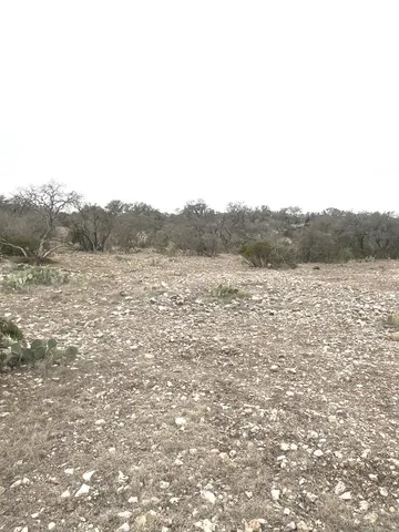 a view of a lake with mountains in the background