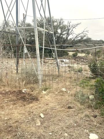 a fire hydrant in the middle of a field