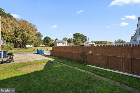 a view of a street with a building in the background