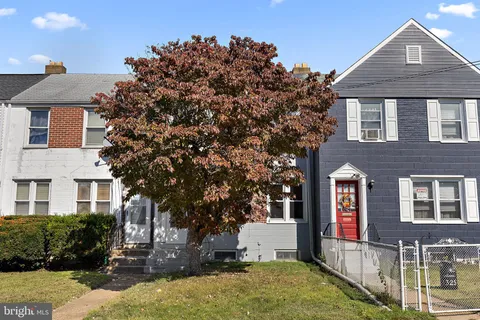 a view of a livingroom with furniture and wooden floor
