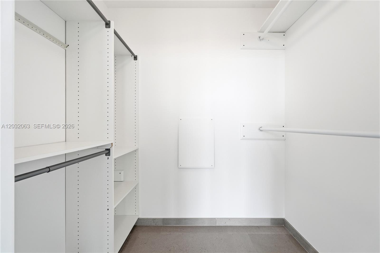 88 Southwest 7th Street, Unit 2302 Miami, FL 33130 - Photo 23 of 26 a view of walk in closet