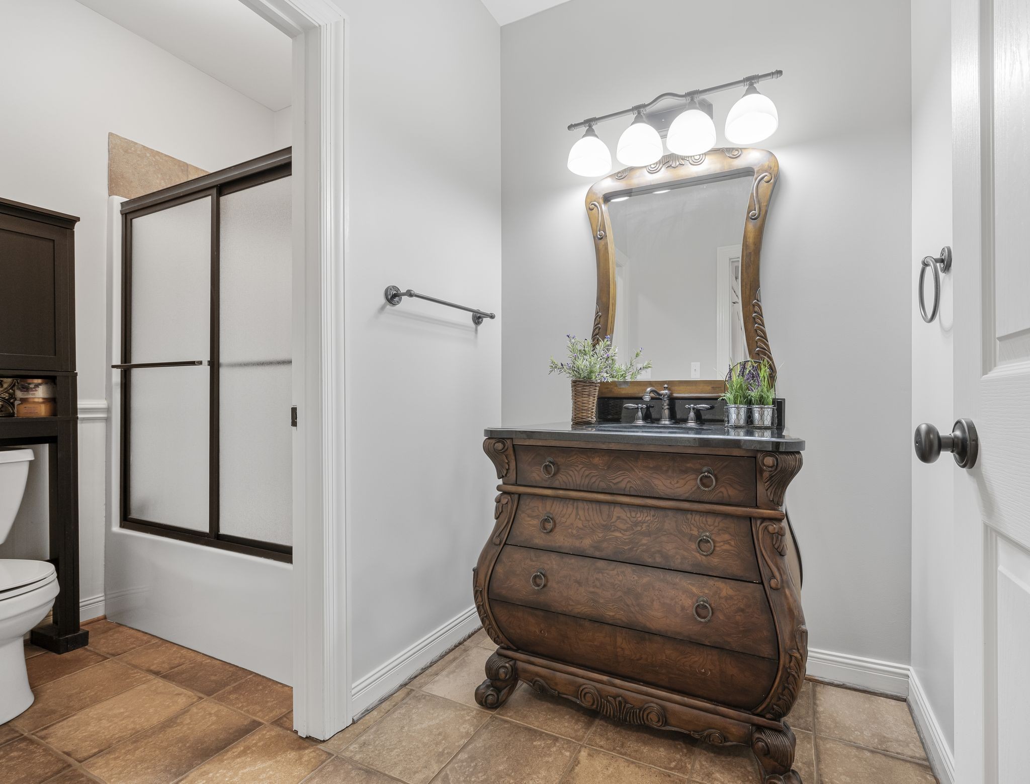 194 Fairview Road Dickson, TN 37055 - Photo 24 of 63 a room with closet a mirror and potted plants