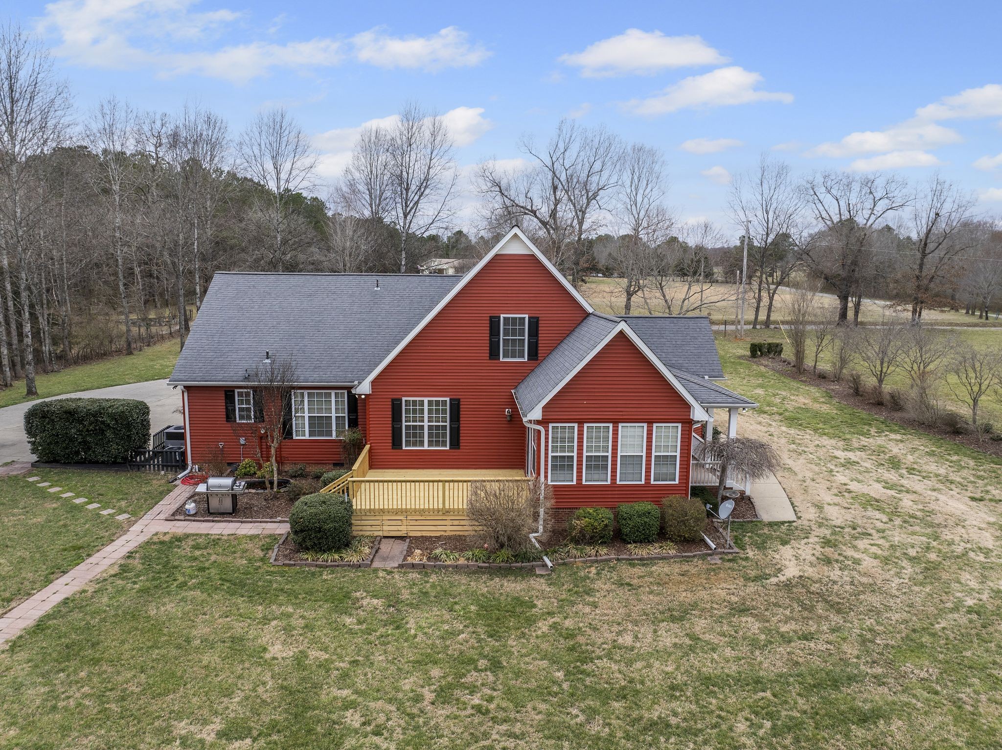 194 Fairview Road Dickson, TN 37055 - Photo 42 of 63 a front view of a house with a yard and garage