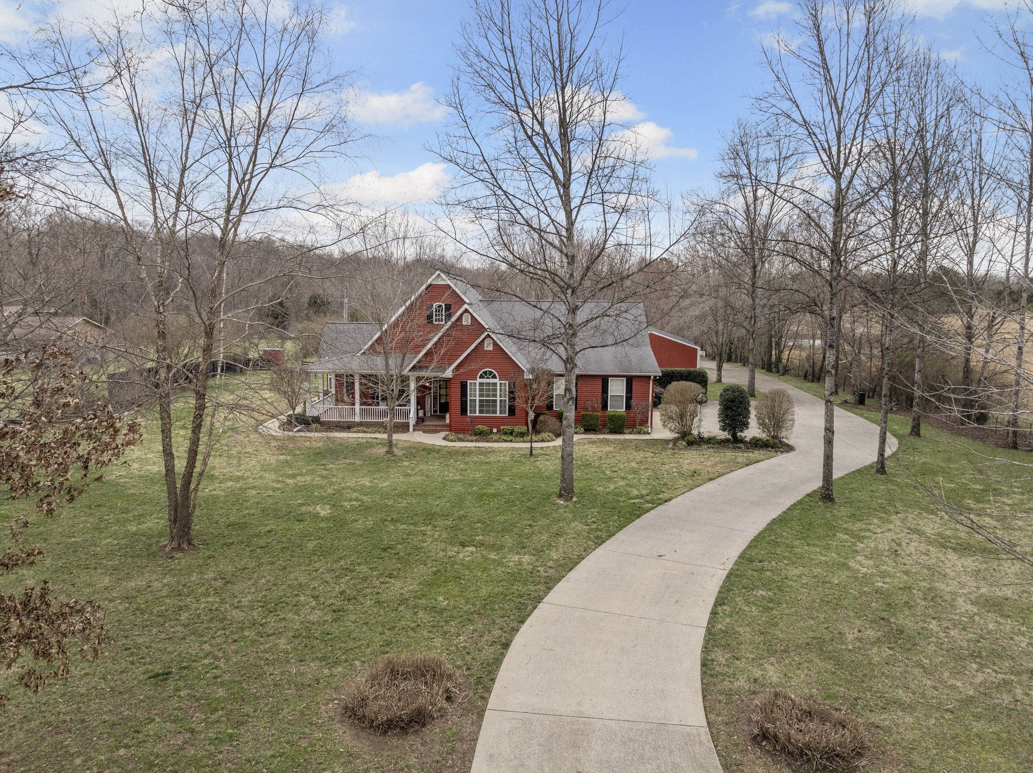 194 Fairview Road Dickson, TN 37055 - Photo 57 of 63 a front view of a house with a yard