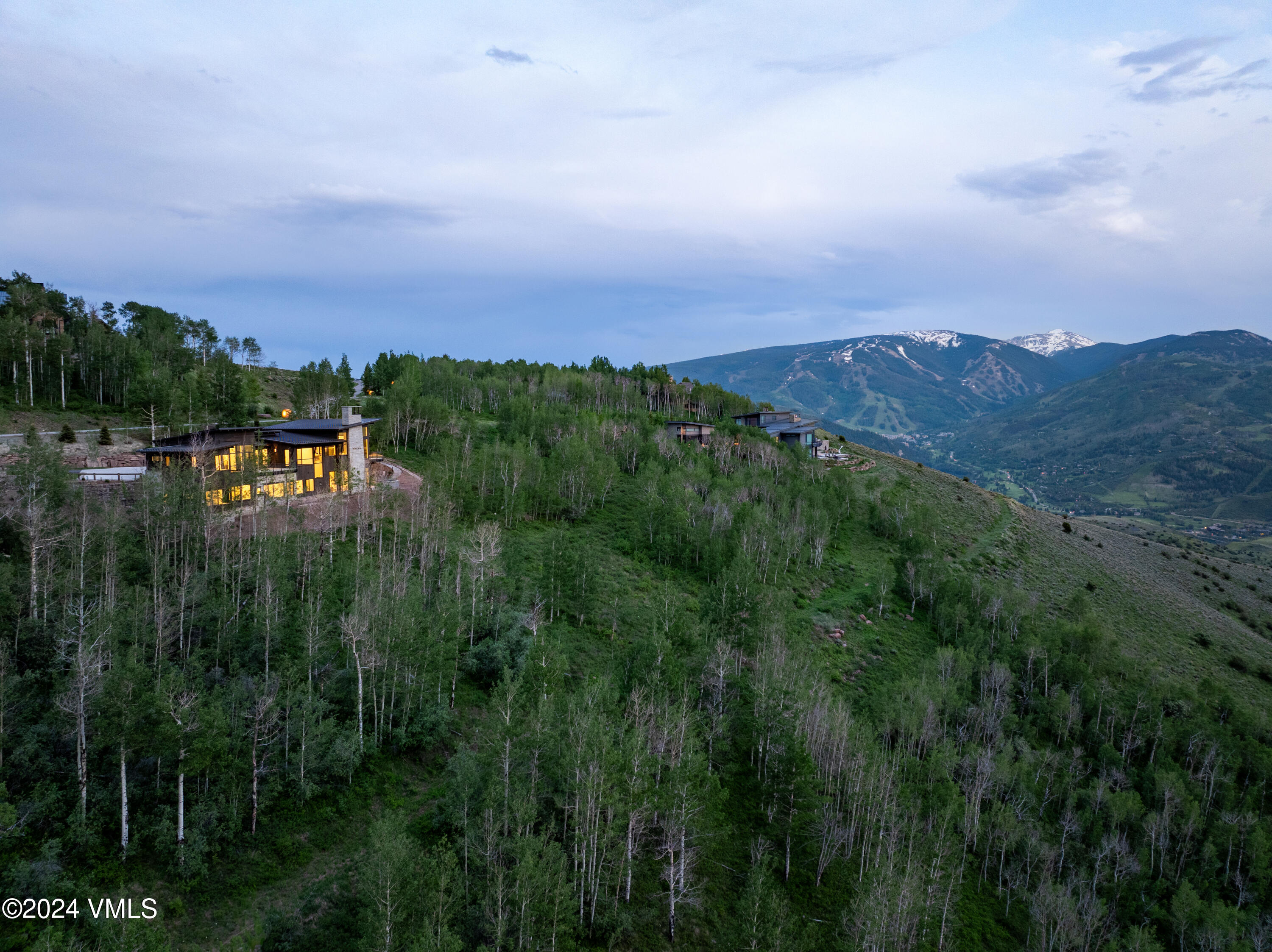 643 Chiming Bells Avon, CO 81620 - Photo 6 of 39 643 Chiming Bells Summer twilight aerial