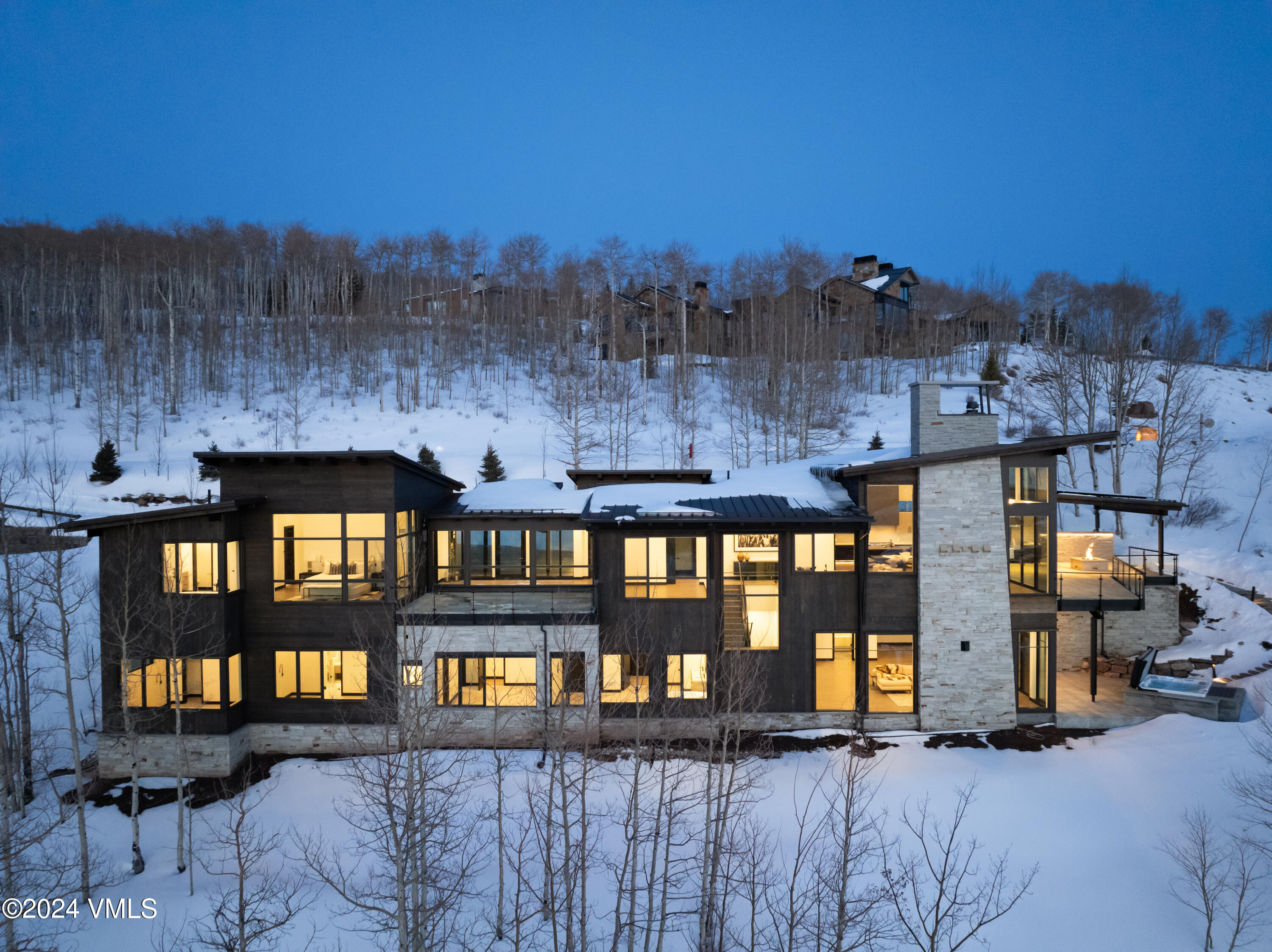 643 Chiming Bells Avon, CO 81620 - Photo 8 of 39 643 Chiming Bells Winter twilight aerial