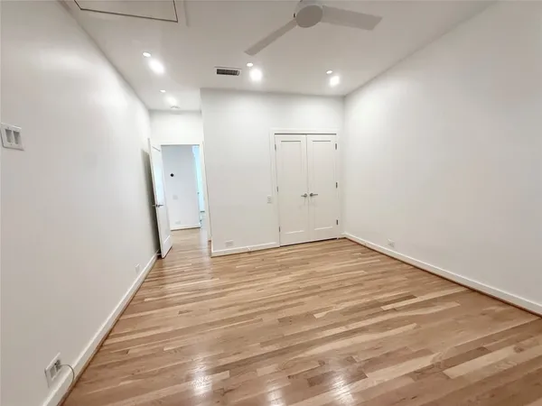 a bathroom with a sink toilet and mirror
