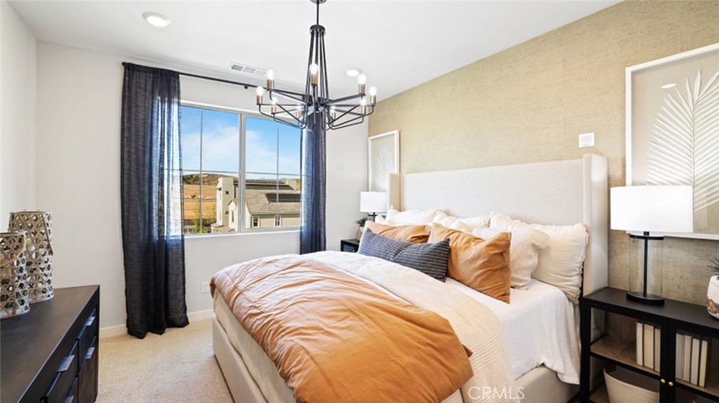 61 Harness Way Rancho Mission Viejo, CA 92694 - Photo 11 of 25 a bedroom with bed and window