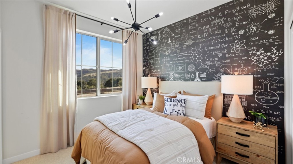 61 Harness Way Rancho Mission Viejo, CA 92694 - Photo 15 of 25 a bedroom with a bed and a window