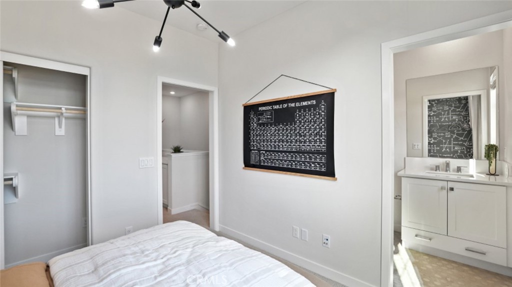 61 Harness Way Rancho Mission Viejo, CA 92694 - Photo 16 of 25 a bedroom with a bed and a window