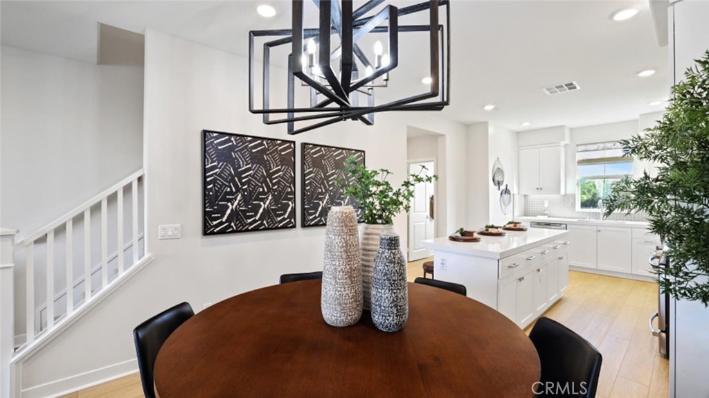 61 Harness Way Rancho Mission Viejo, CA 92694 - Photo 7 of 25 a kitchen with stainless steel appliances granite countertop a sink and cabinets