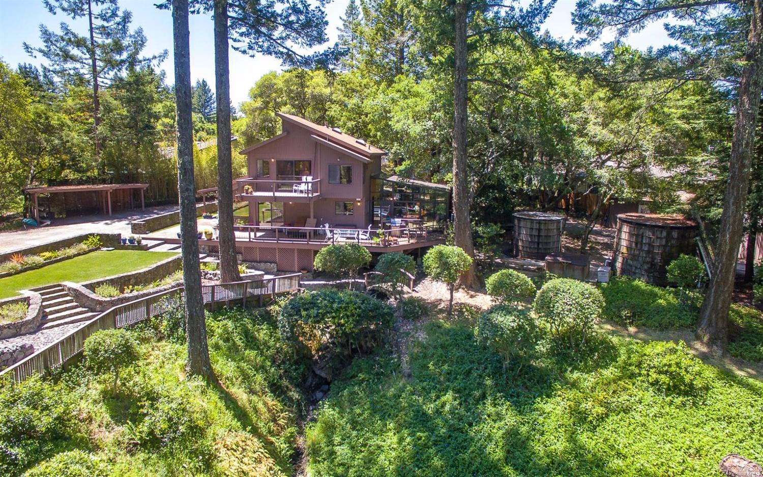 4235 Harrison Grade Road Sebastopol, CA 95472 - Photo 1 of 1 a view of backyard with plants and outdoor seating