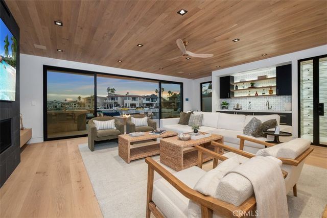 a bedroom with a large bed and a large window