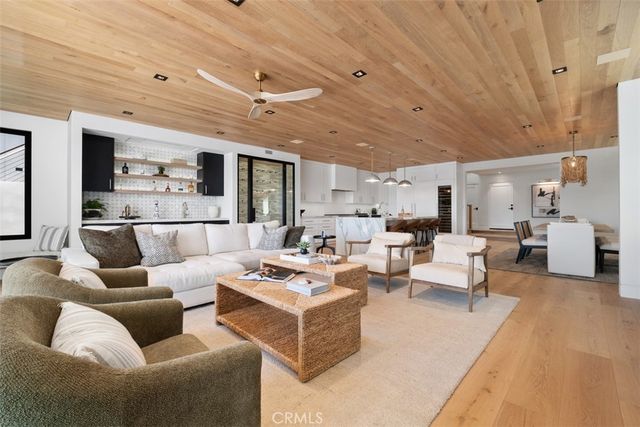 a spacious bathroom with a double vanity sink mirror and next to a window