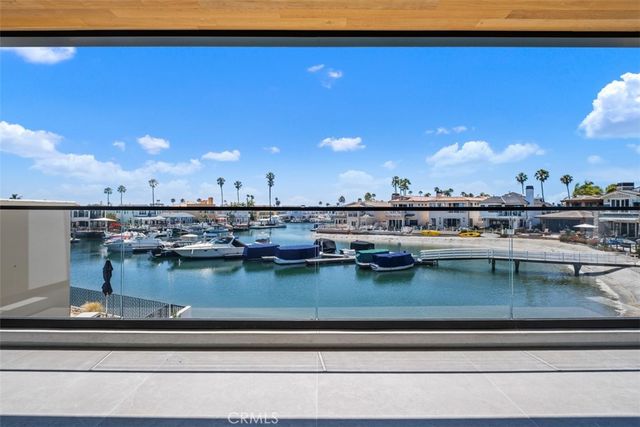 a view of a living room and a chandelier