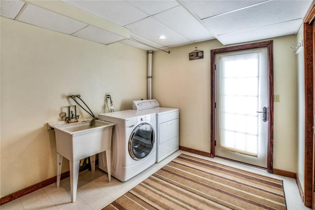 5099 West Harbison Road Pittsburgh, PA 15276 - Photo 16 of 20 Large laundry room with cabinets.