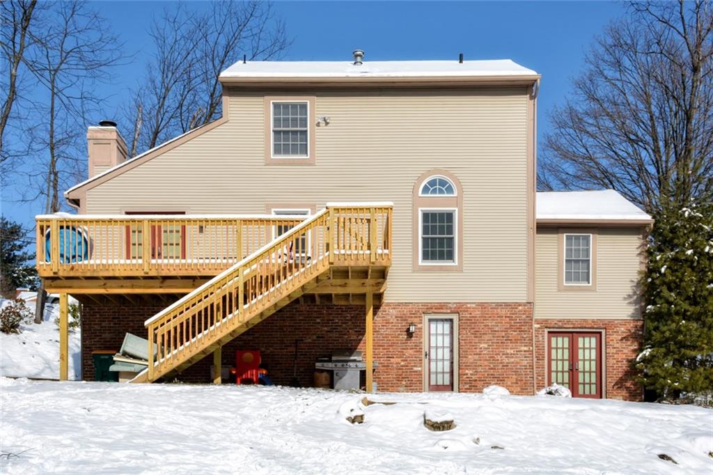 5099 West Harbison Road Pittsburgh, PA 15276 - Photo 20 of 20 Rear of home features large, brick patio under the deck. Walk right out and enjoy!