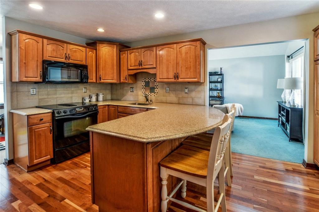 5099 West Harbison Road Pittsburgh, PA 15276 - Photo 8 of 20 Enjoy breakfast at your large kitchen island.
