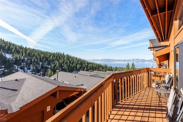 a view of balcony with furniture