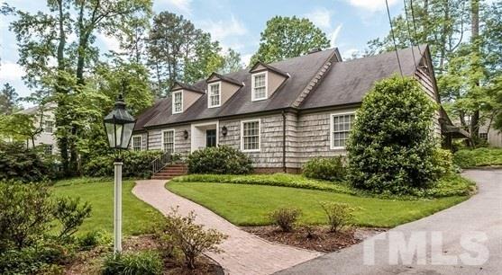 3313 Landor Road Raleigh, NC 27609 - Photo 1 of 25 a front view of a house with a yard