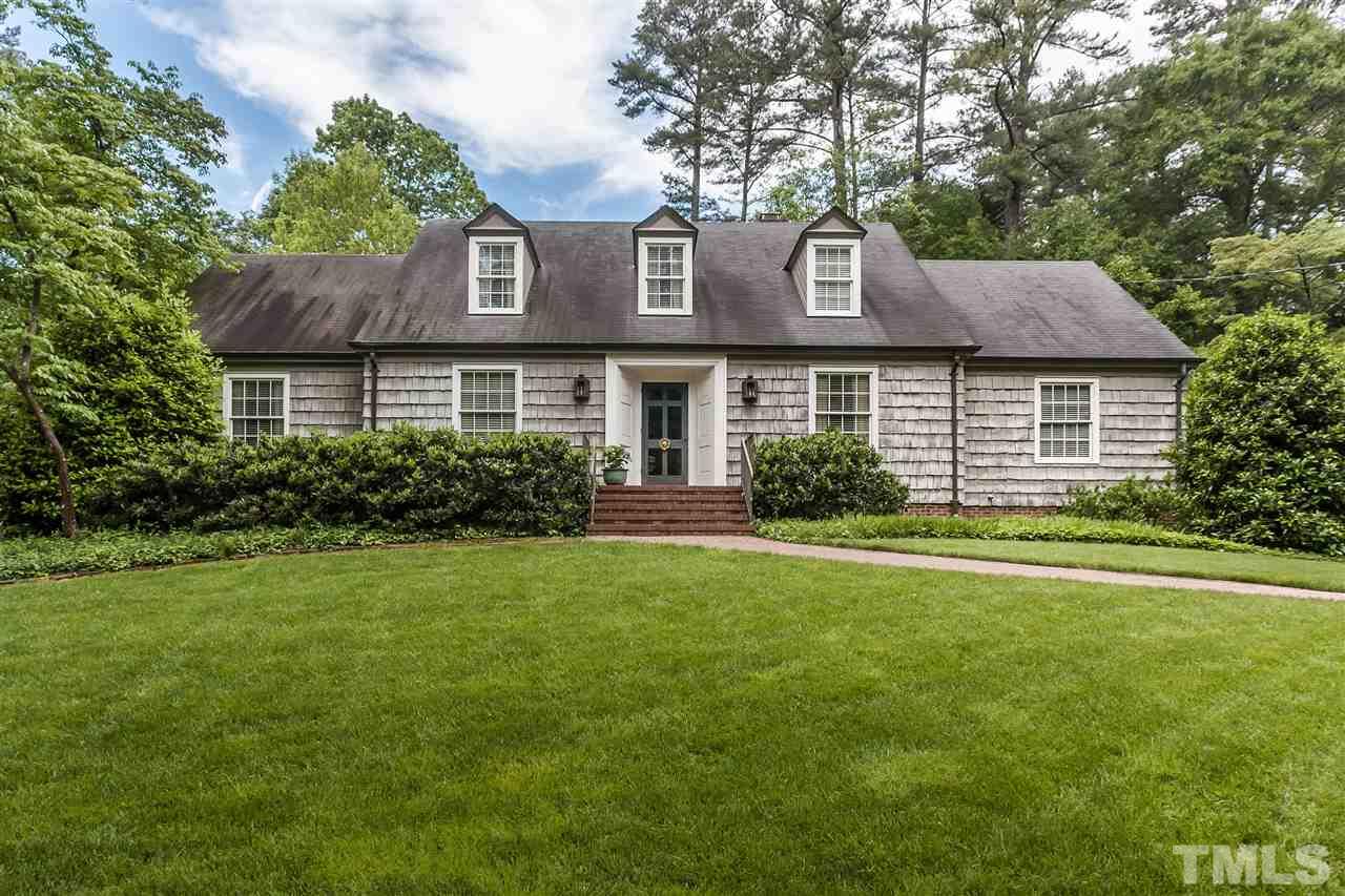 3313 Landor Road Raleigh, NC 27609 - Photo 2 of 25 a front view of a house with a garden