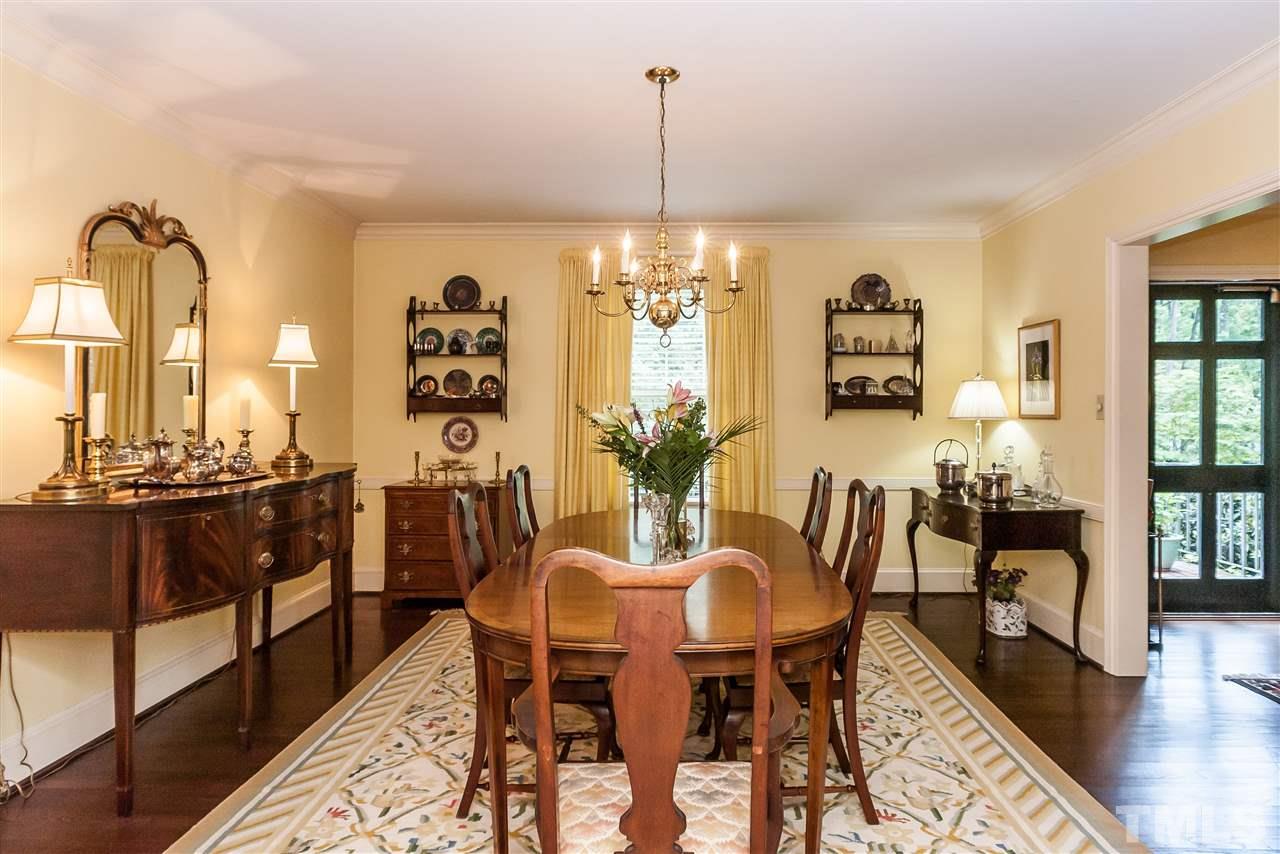 3313 Landor Road Raleigh, NC 27609 - Photo 4 of 25 a view of a dining room with furniture window and wooden floor