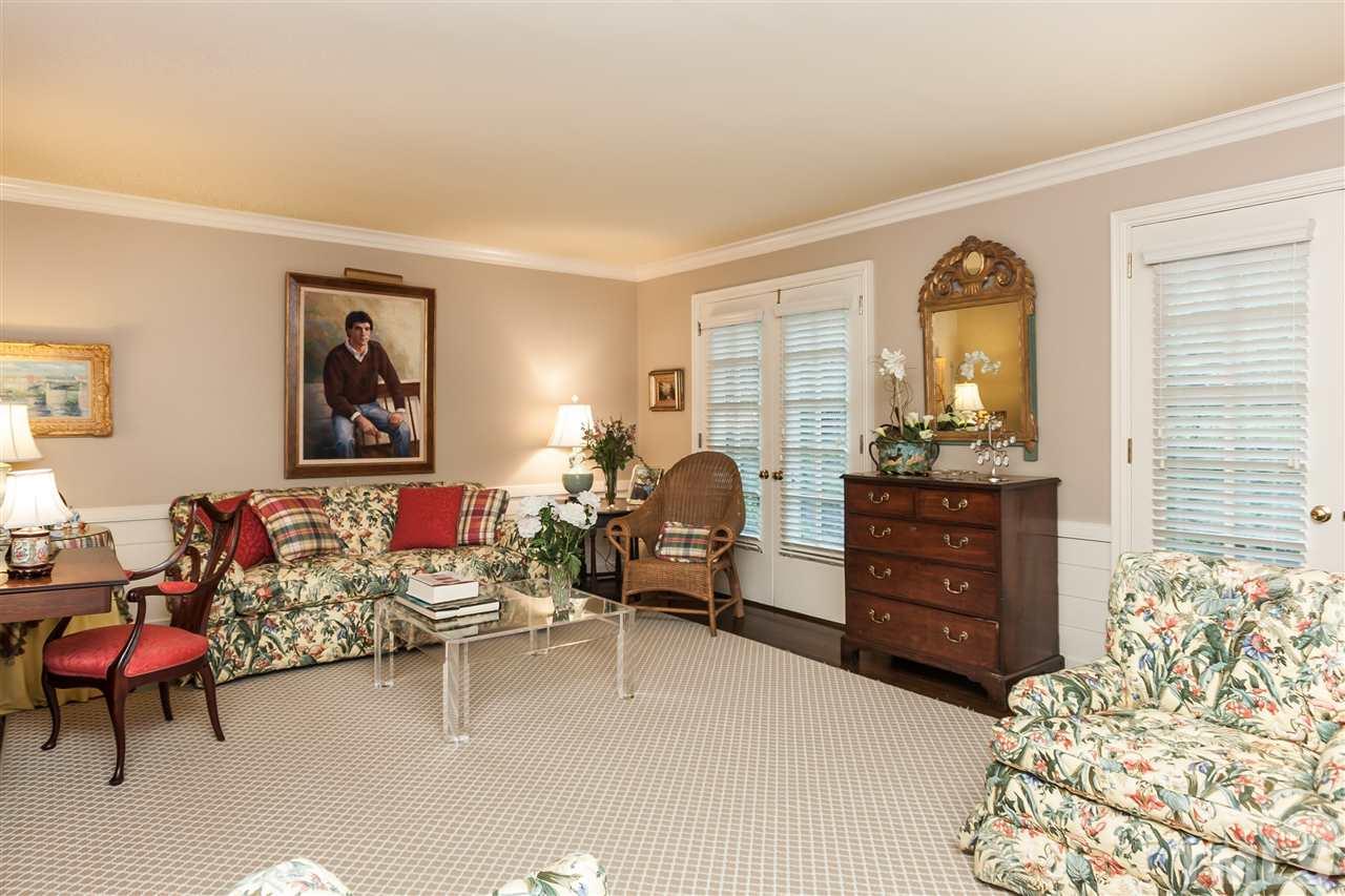 3313 Landor Road Raleigh, NC 27609 - Photo 5 of 25 a living room with furniture and a window