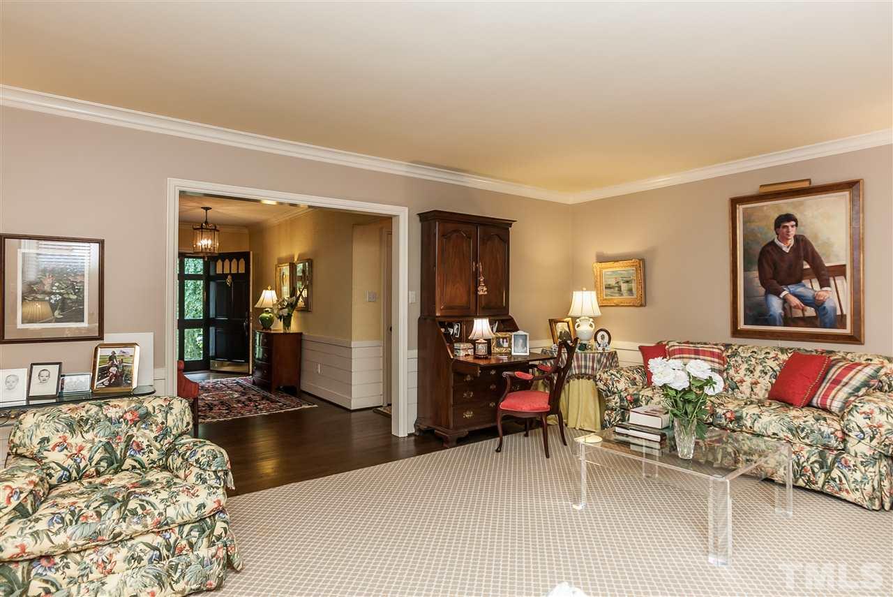 3313 Landor Road Raleigh, NC 27609 - Photo 7 of 25 a living room with furniture and a large window