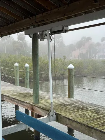 a view of room with wooden floor