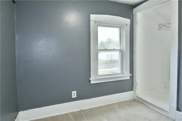 a view of a hallway with closet area