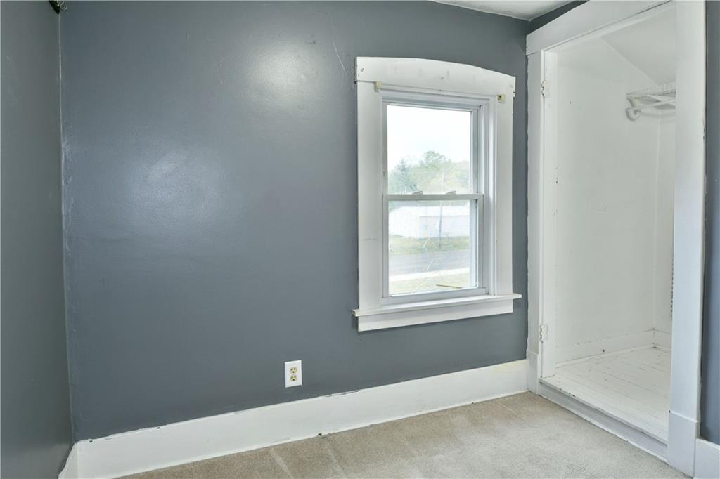 1107 West Ridge Avenue Sharpsville, PA 16150 - Photo 23 of 48 a view of an empty room with a window