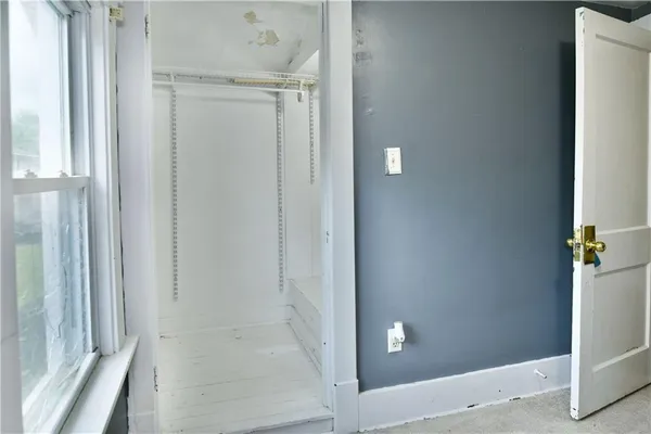 an empty room with a window