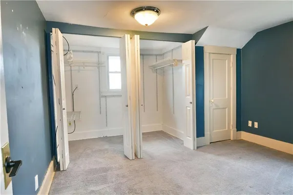 an empty room with closet