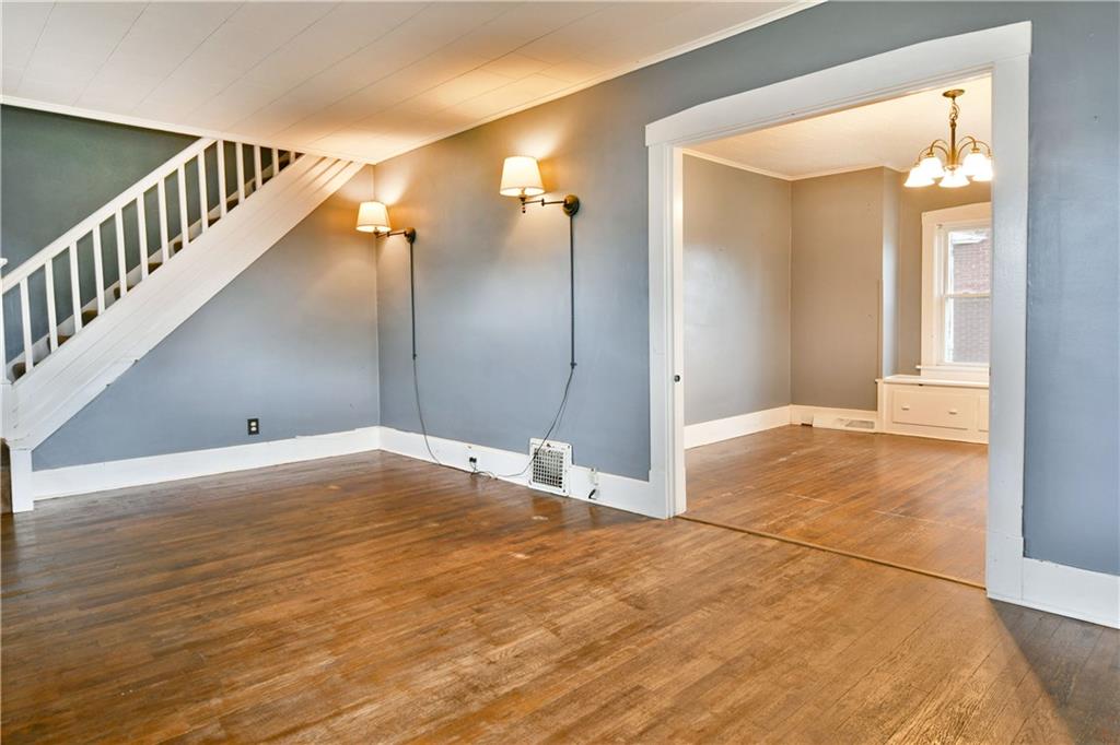1107 West Ridge Avenue Sharpsville, PA 16150 - Photo 7 of 48 a view of a big room with wooden floor and windows