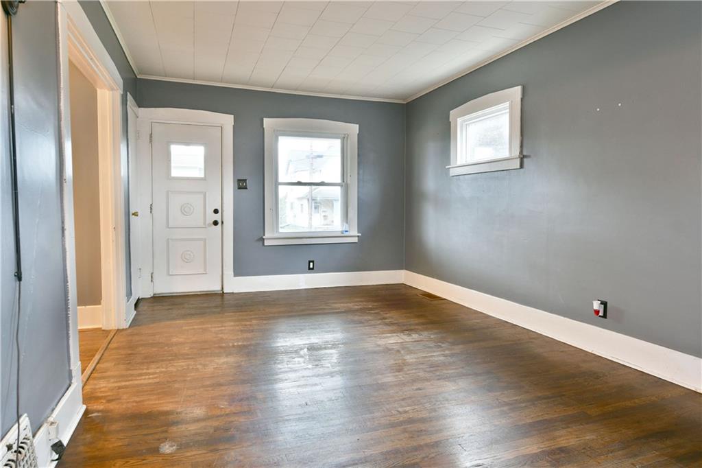 1107 West Ridge Avenue Sharpsville, PA 16150 - Photo 9 of 48 a view of empty room with wooden floor and fan