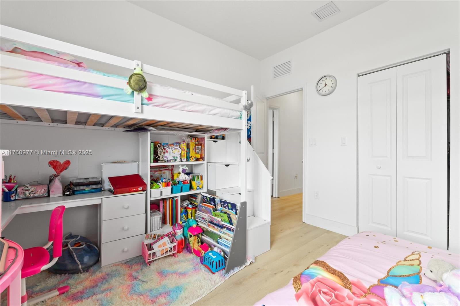 12824 Northwest 22nd Place, Unit 12824 Miami, FL 33167 - Photo 34 of 47 a children room with toys and a flat screen tv