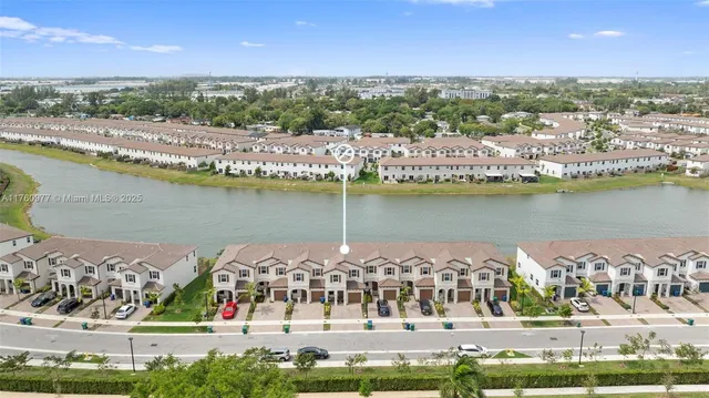 an aerial view of a city with houses