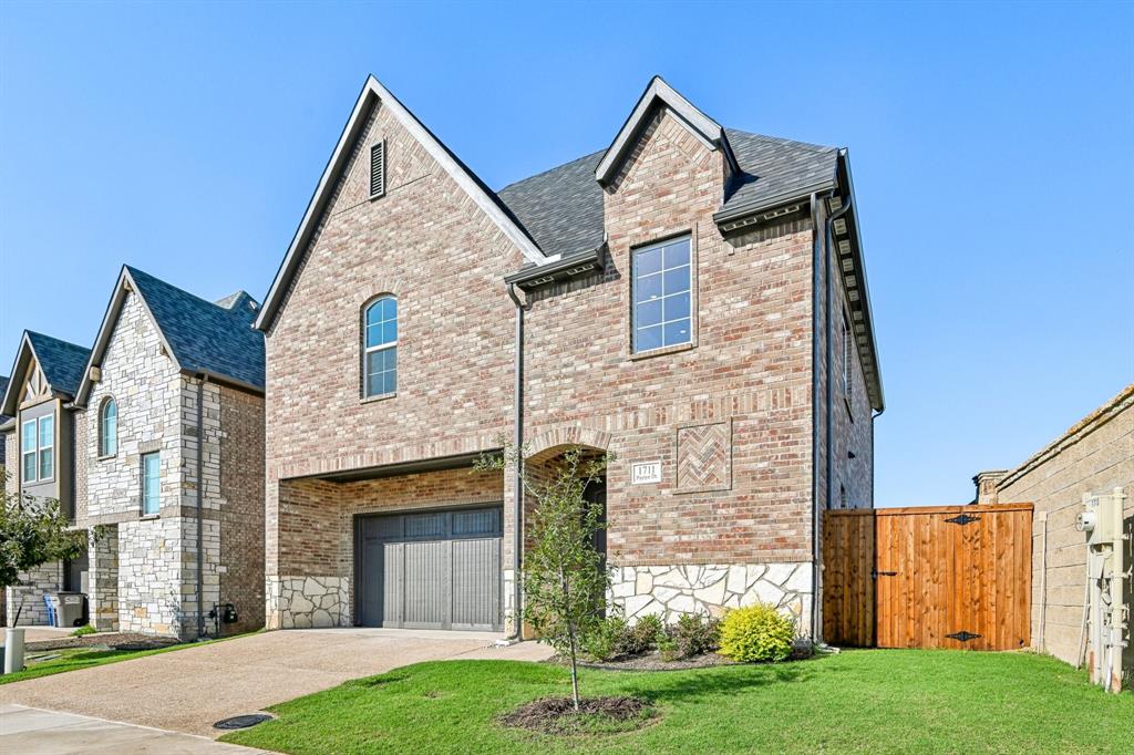 1711 Paytyn Drive Allen, TX 75013 - Photo 2 of 37 View of front of property featuring a garage and a front lawn