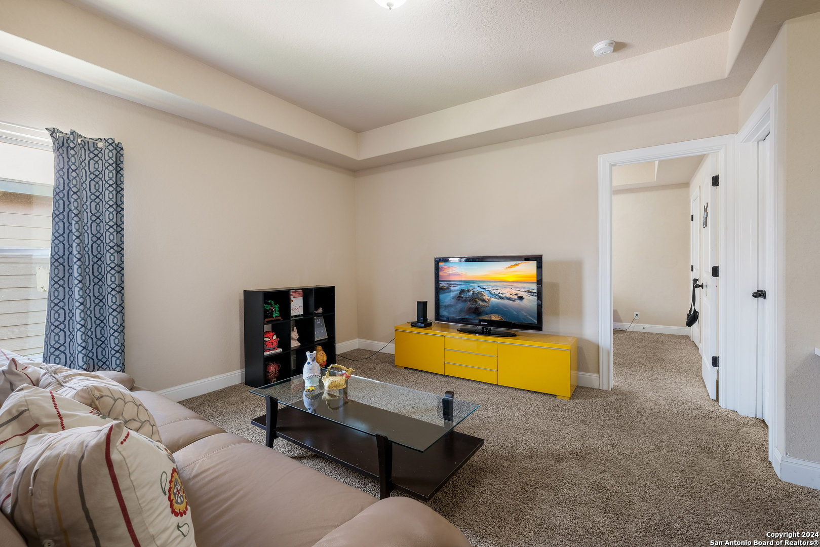 24503 Merlot Way San Antonio, TX 78260 - Photo 22 of 26 a bedroom with a bed and a couch