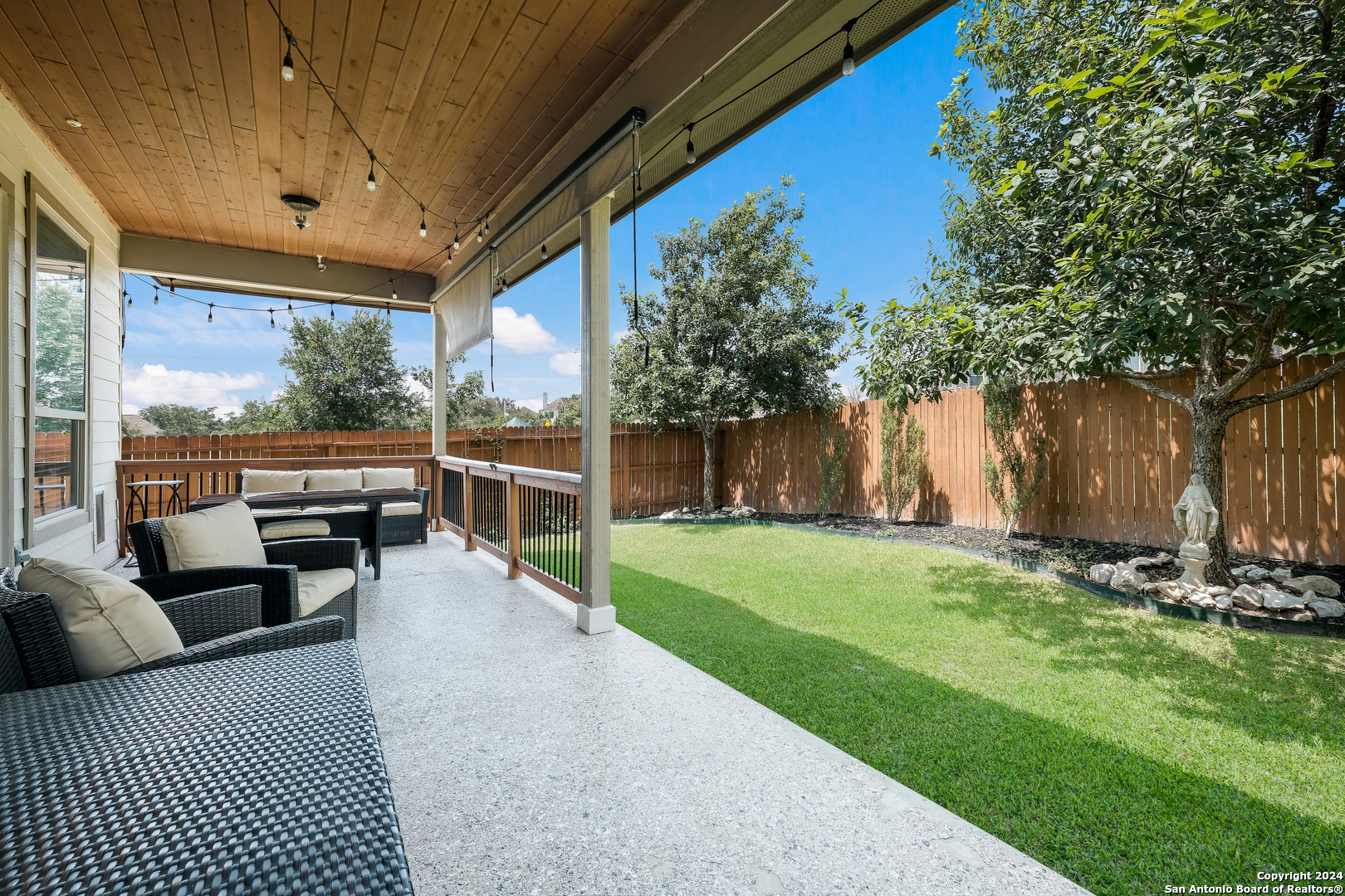 24503 Merlot Way San Antonio, TX 78260 - Photo 25 of 26 a view of a porch with furniture and a yard