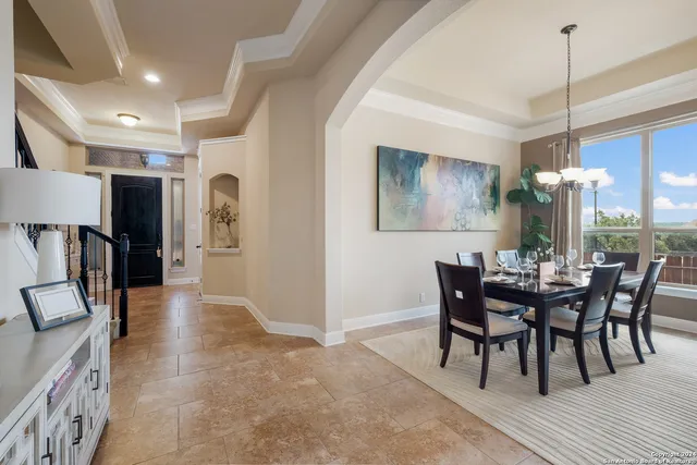 a view of a dining room with furniture