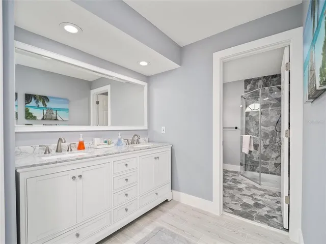 a bathroom with a shower and a toilet