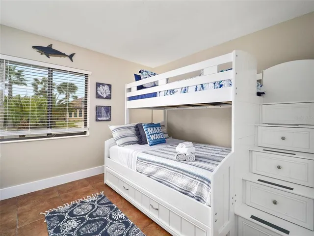 a living room with furniture and flat screen tv