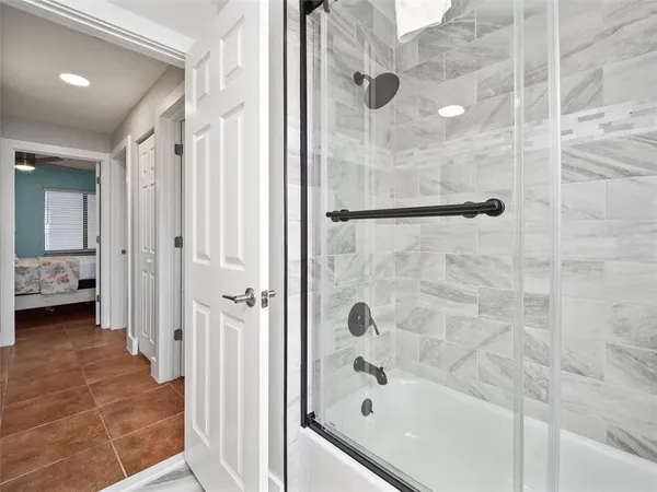 a view of a swimming pool with a yard