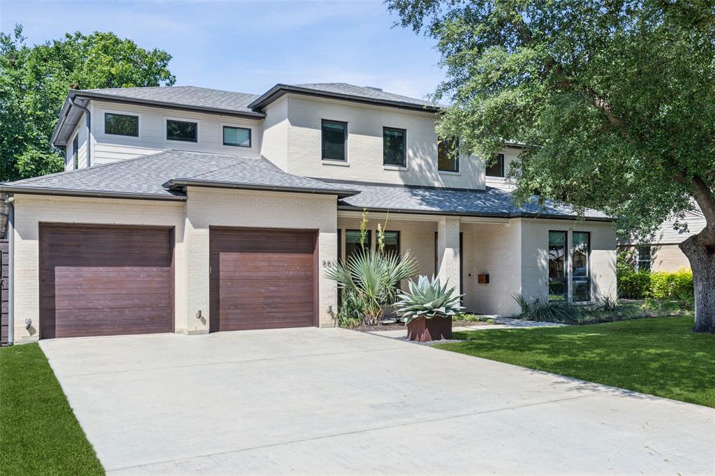 front view of a house with a yard