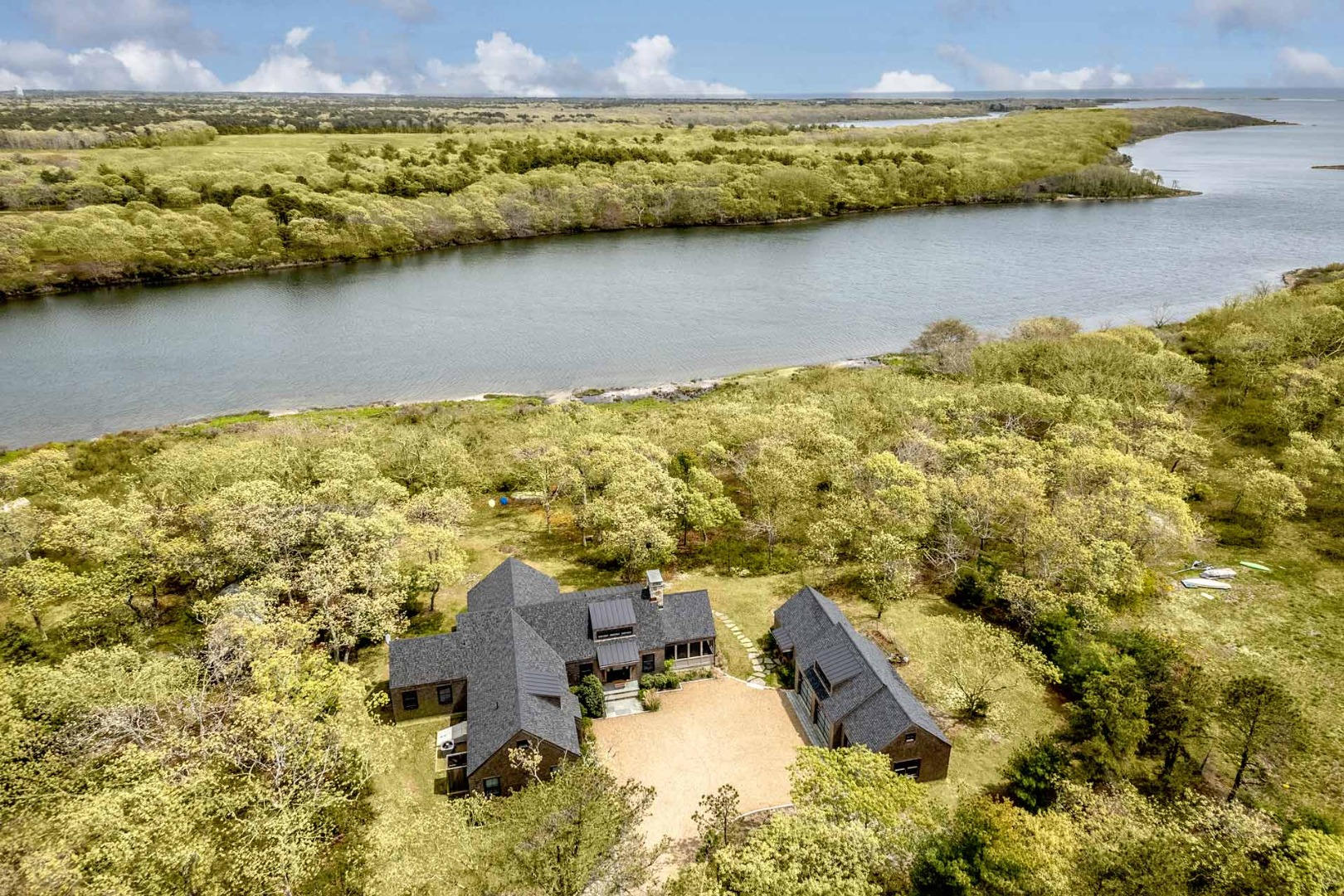 an aerial view of residential houses with outdoor space