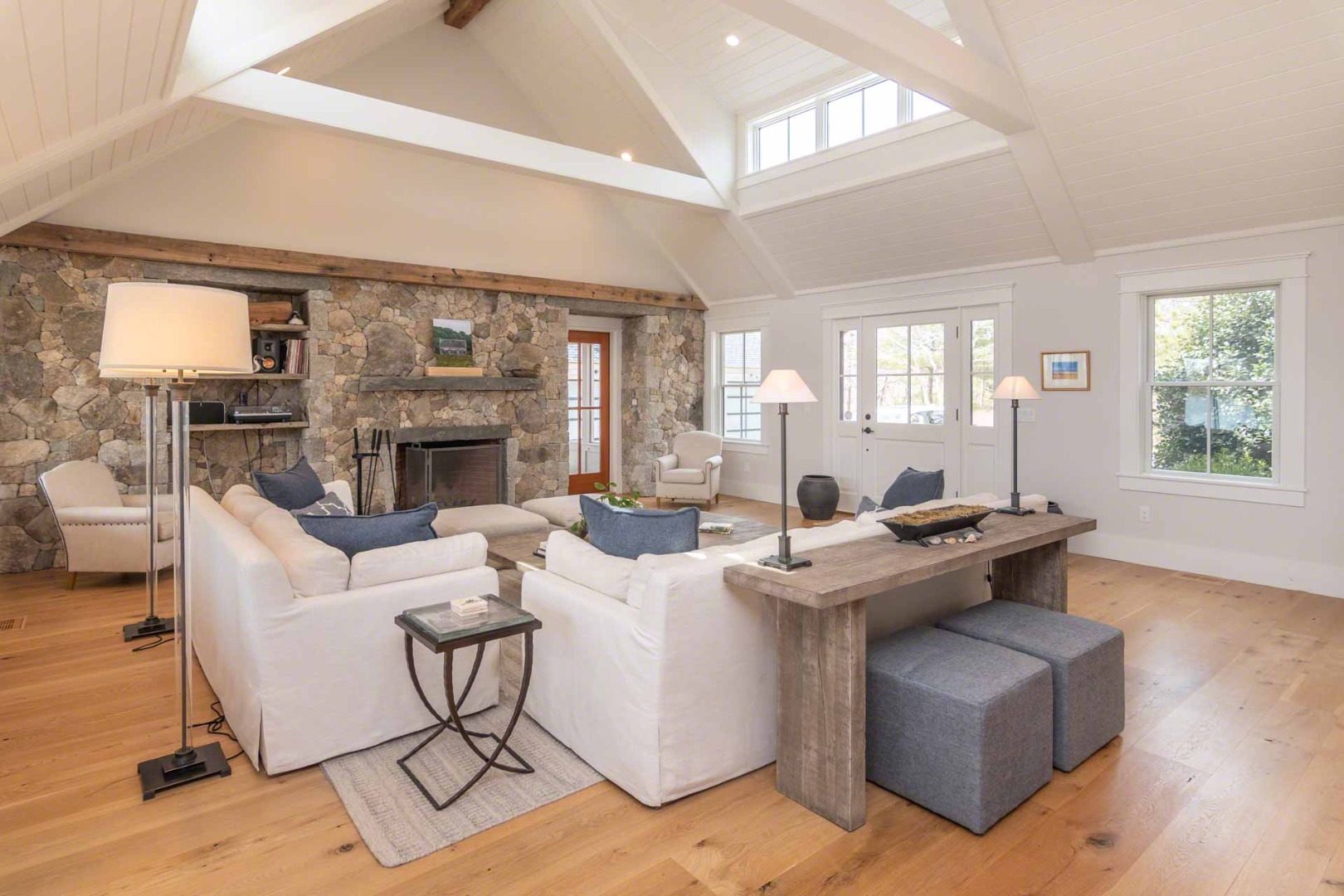 59 Seth's Way Edgartown, MA 02539 - Photo 11 of 46 a living room with fireplace furniture and a large window
